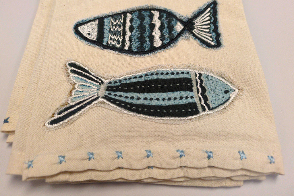 cotton dish towels with detailed applique and embroidery in coastal theme on a tea towel