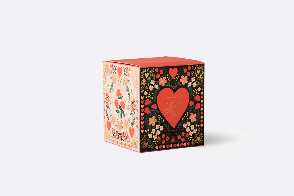 Decorative box with floral patterns and a heart design on a white background