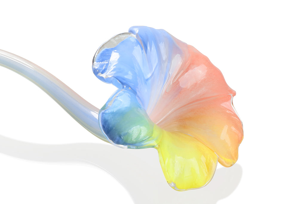 Art glass flower in rainbow colors, soft blues, pinks, oranges and yellow petals
#color_rainbow 
