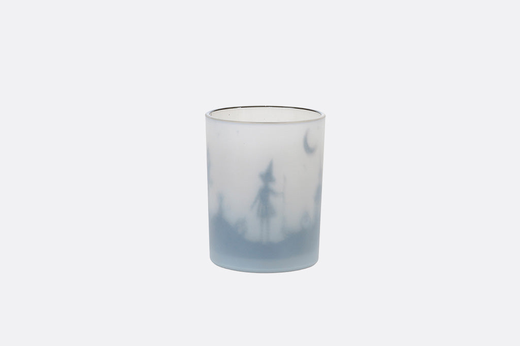 Glass tumbler with a gradient design on a white background