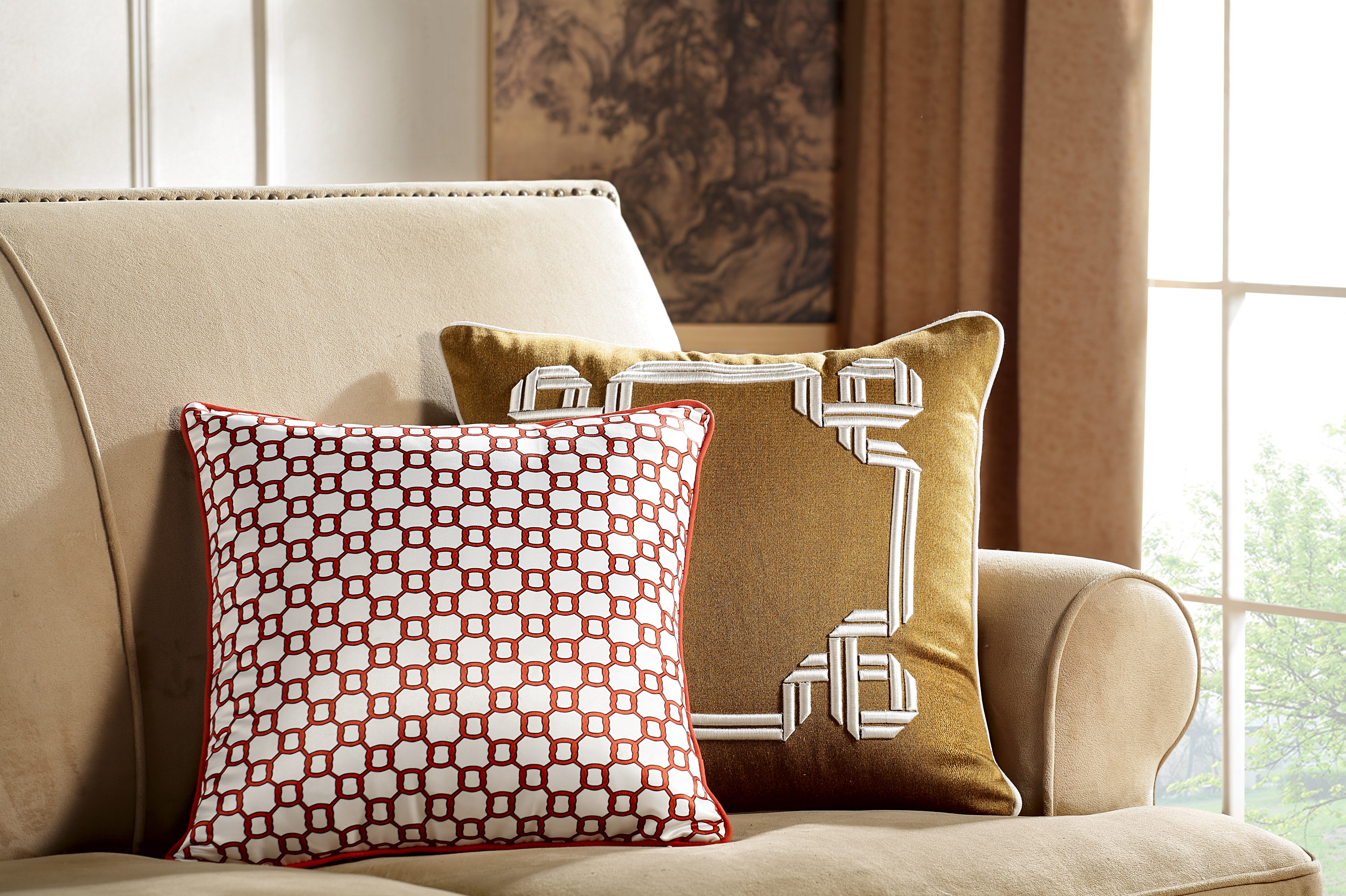 asian themed throw pillows shown on couch in living room