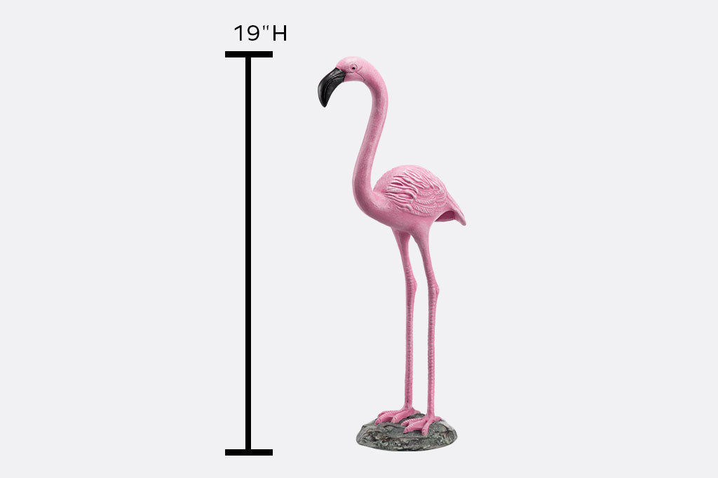 Pink flamingo statue with a measurement label indicating its height on a white background