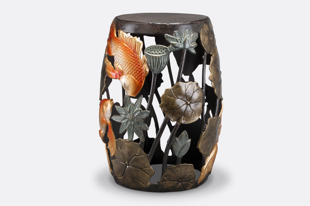 Cast Metal koi fish and water lily garden/ accent stool. golden orange koi surrounded by bronze water lily motifs. 