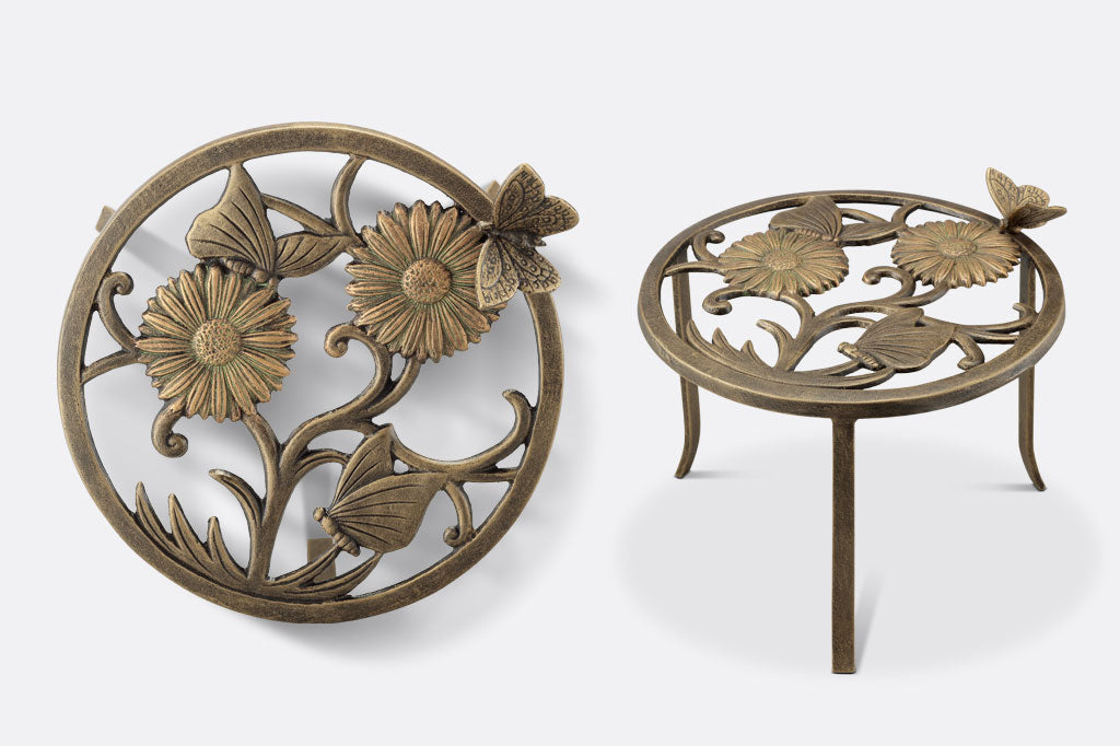 top down view of plant stand as well as side profile, showing curved legs and three dimensional butterfly