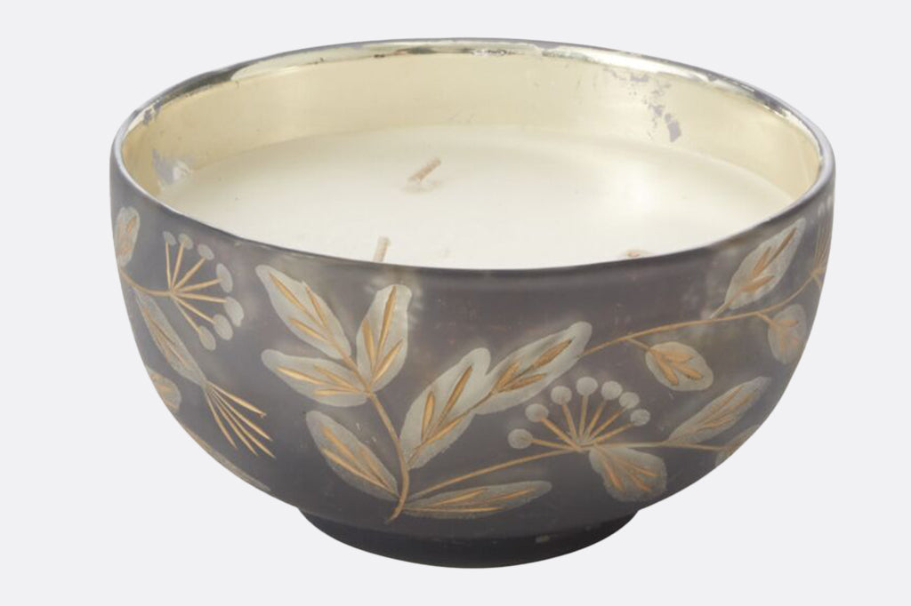 3 wick holiday candle in a blue hand etched vessel, design features swirling leaves and florals 