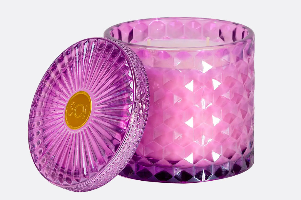 Soy wax floral scented candle in pink, crystal cut-glass vessel with decorative lid