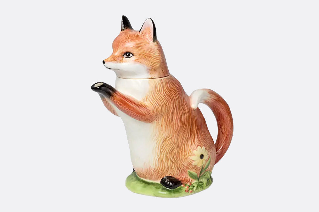 Fox-shaped teapot on a light gray background