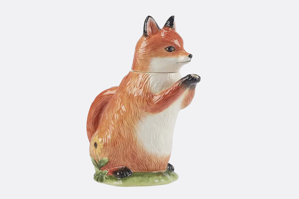 Fox teapot on a white background, facing right