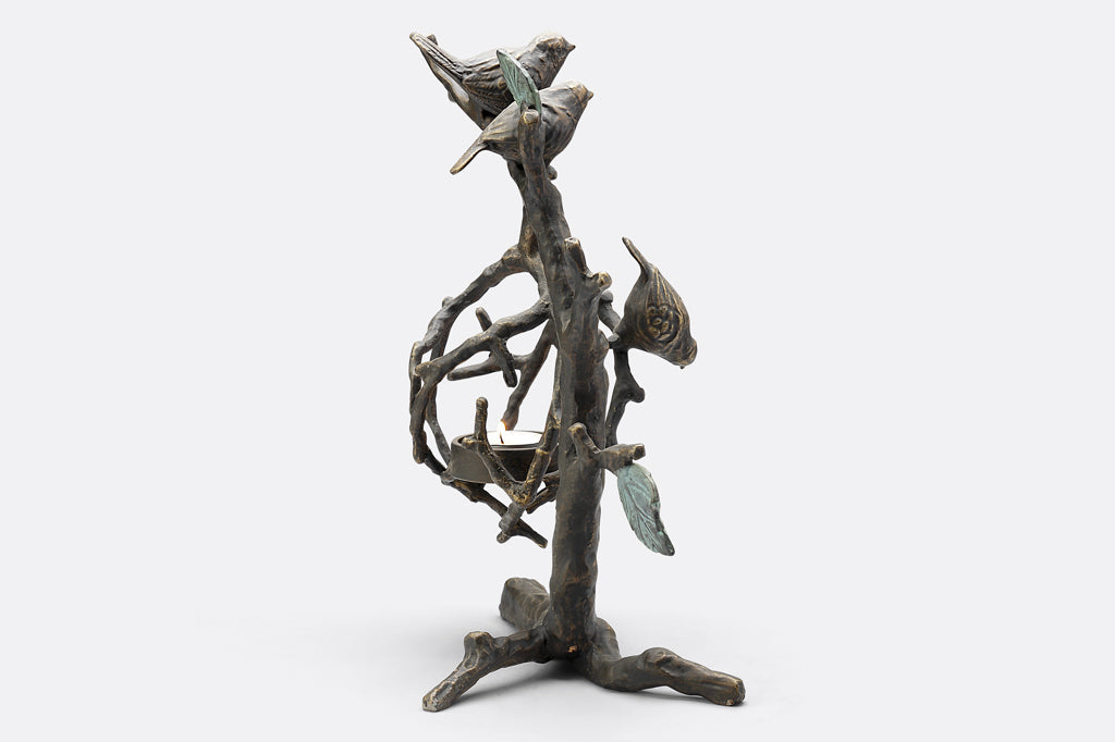 hanging tea light holder, sculpture of birds on a branch with Side view of interlocking twigs to form a tealight cage