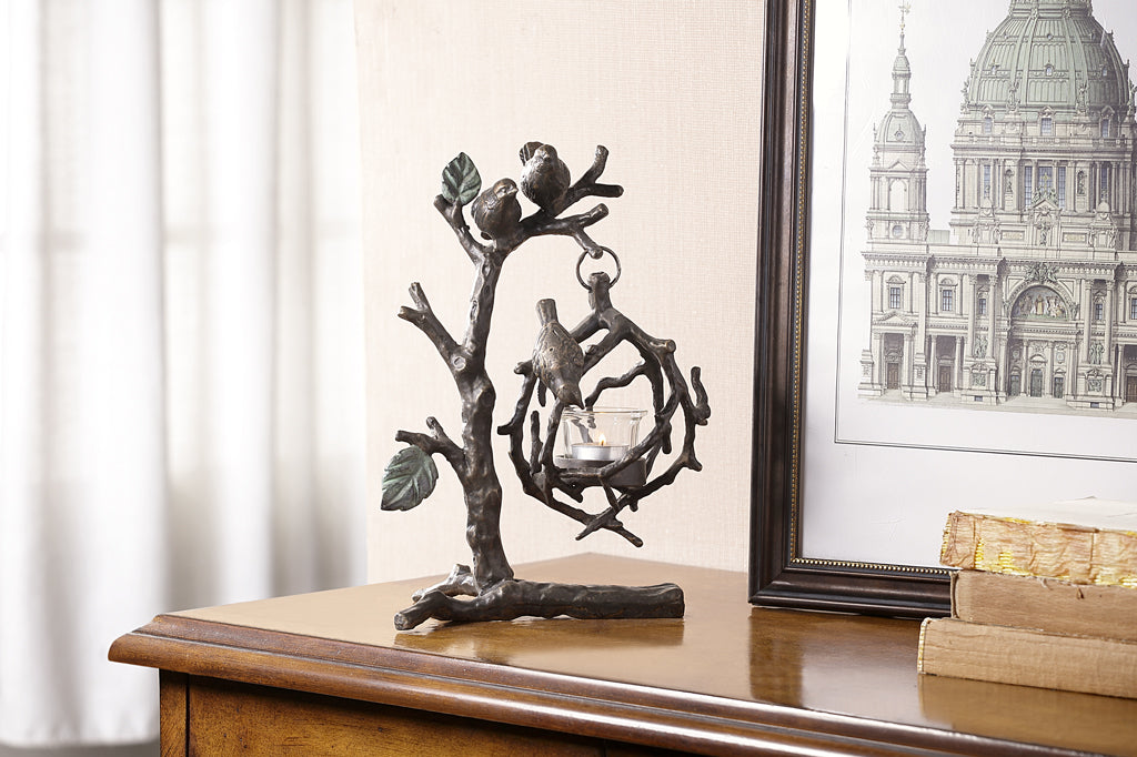 hanging tea light holder, sculpture of birds on a branch with interlocking twigs to form a tealight cage