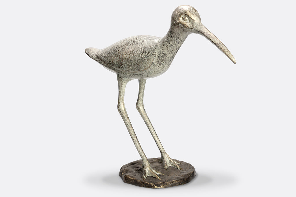 cast metal sandpiper sculpture 