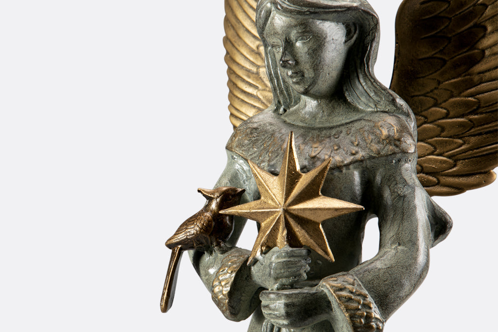 close up view of back view of Angelic Acquaintnces face, bird, and star details