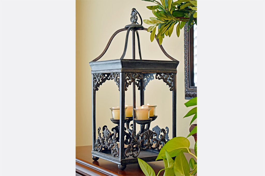 Rouleau Votive Lantern on a console table in dining room