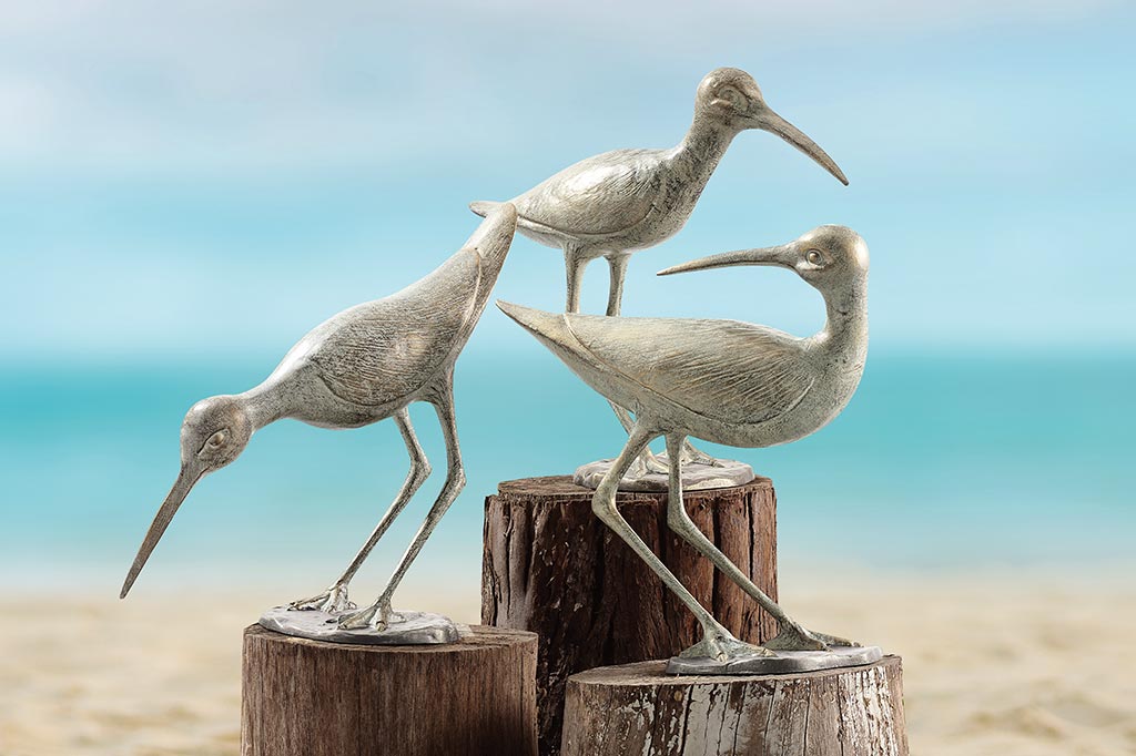 Light colored sandpiper bird cast metal sculpture. Set of three full collection 