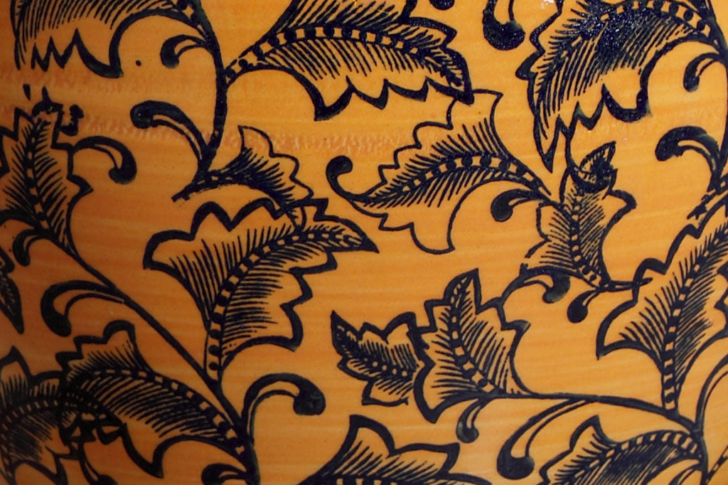 closeup of Arancione Vase twining leaves motif