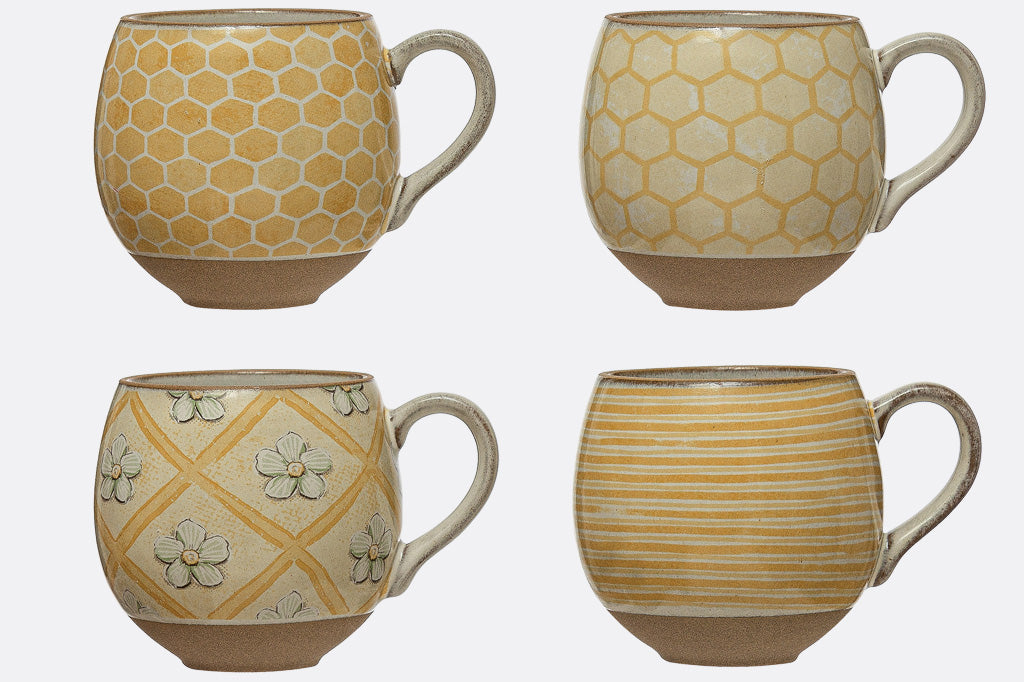 4 coordinating stoneware mugs in cream and yellow with a bee theme