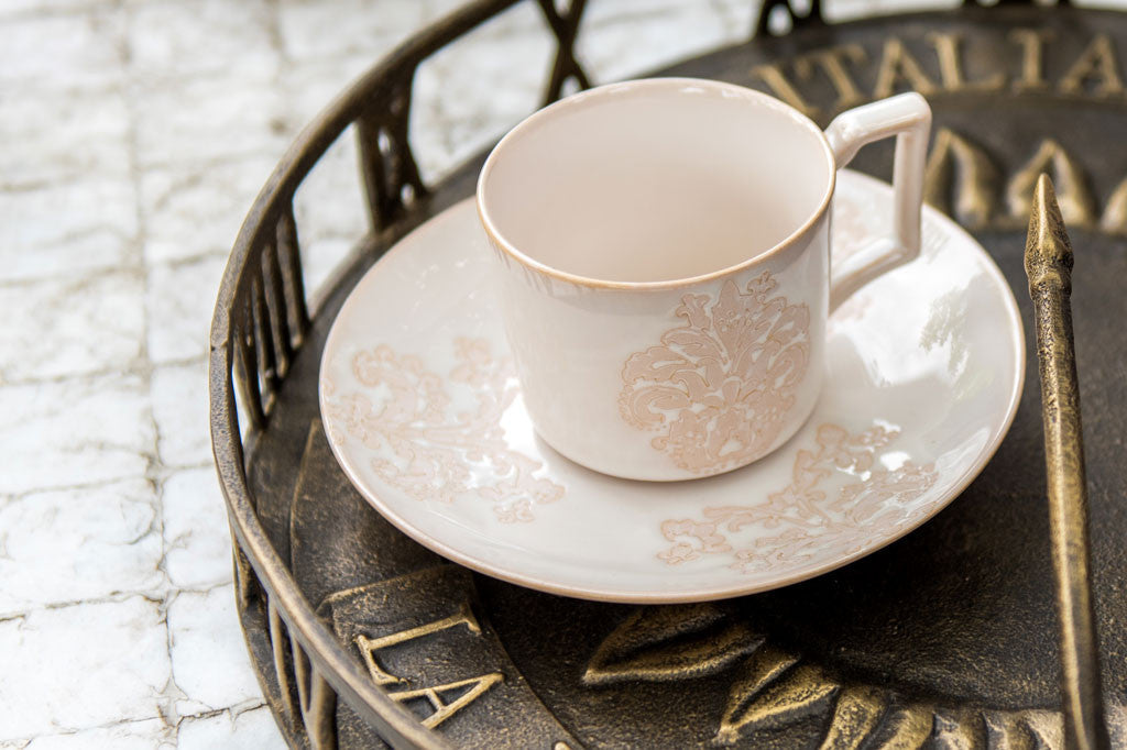 damask embossed teacup and saucer shown on the Italian Time Serving Tray and Sundial